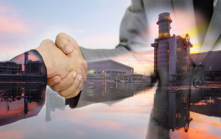 Double exposure of business women double handshake