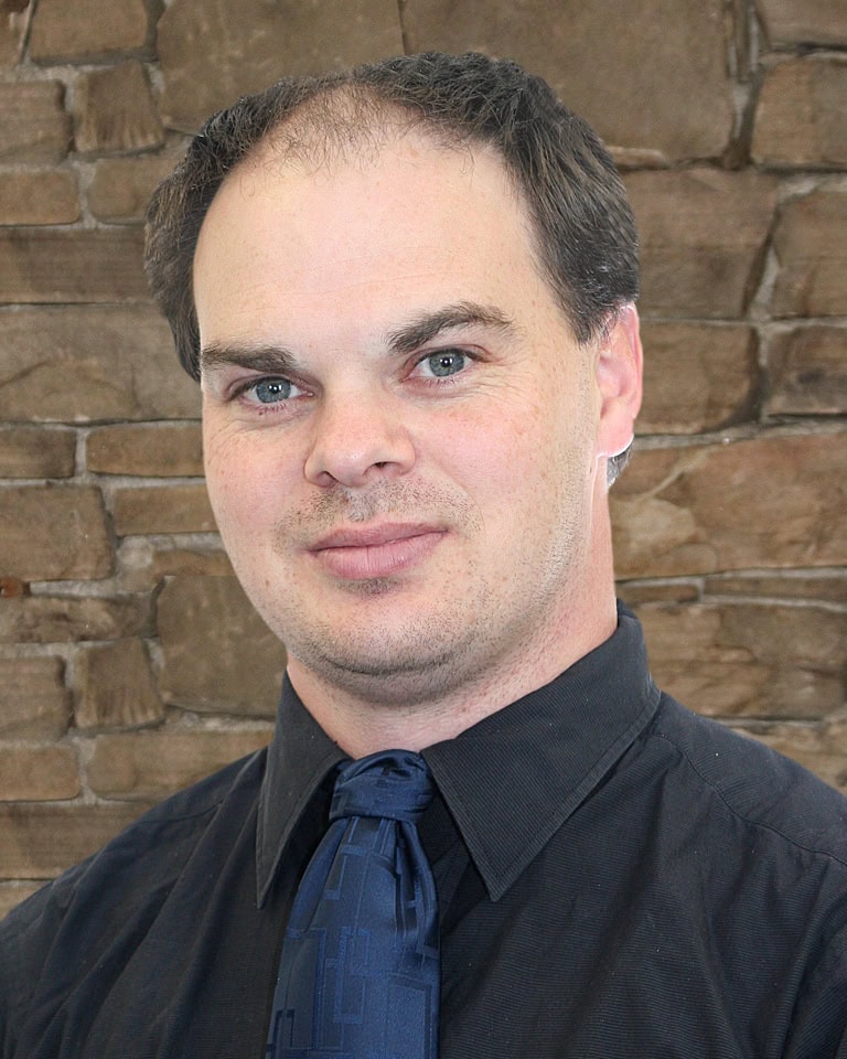Headshot of Andrew Rumsby